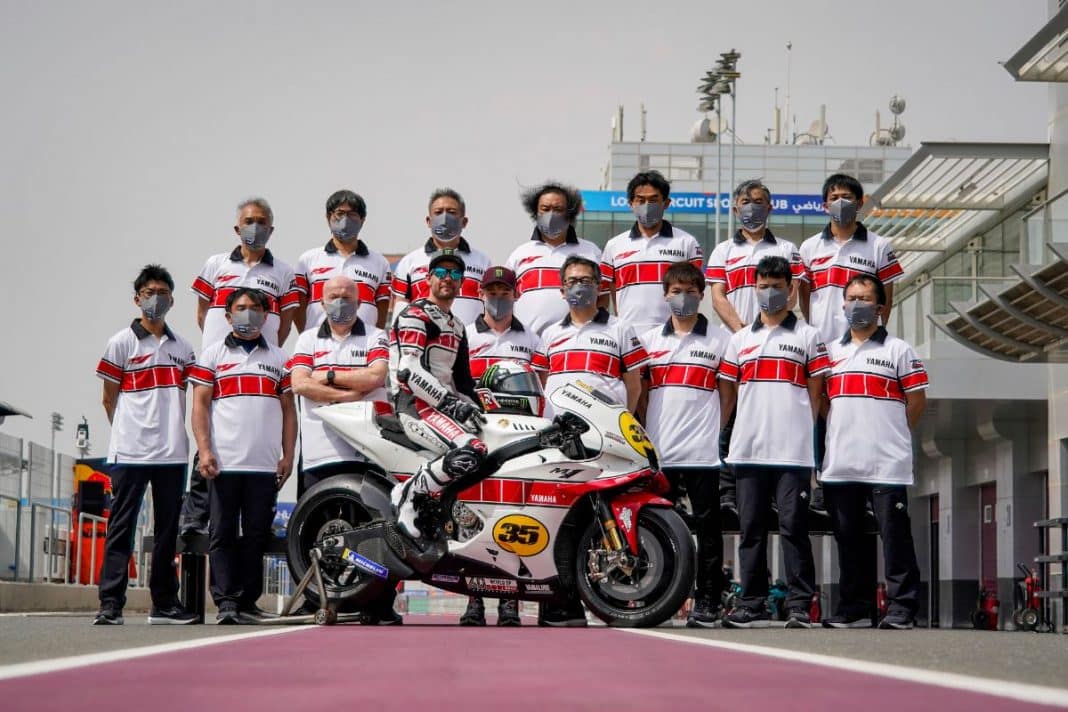 Cal Crutchlow Celebrating 60 Years of Grand Prix Racing with YZR M1 in Traditional Yamaha WhiteRed Livery